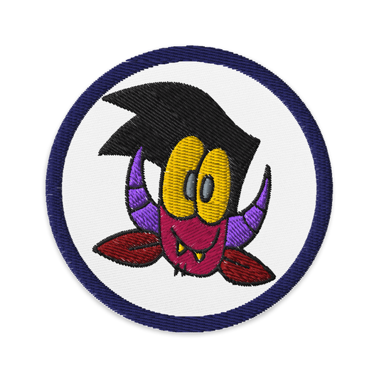 embroidered patch of a graffiti devil character by Brighton street artist CORKiE