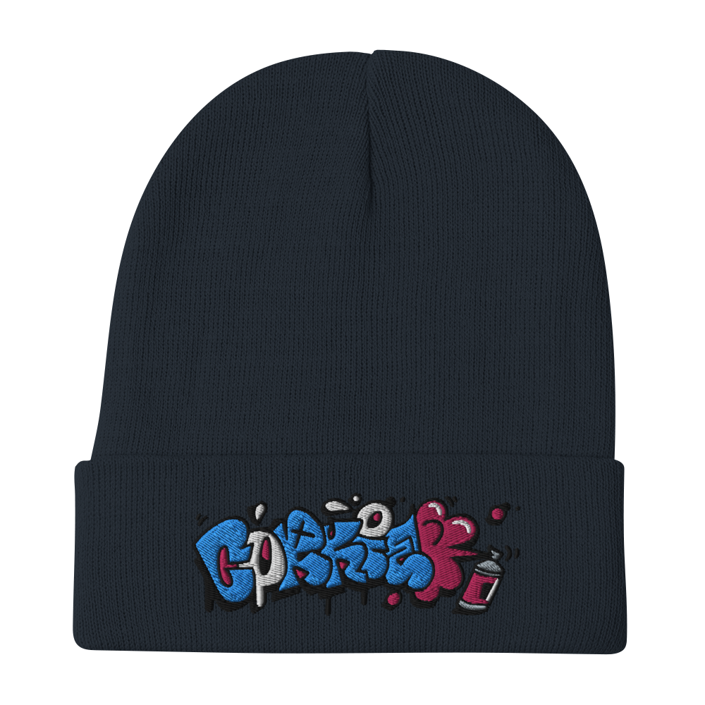 graffiti throwie beanie. Graff bubble letters embroidered onto a navy blue hat saying CORKiE. Created by Brighton street artist Cordelius Kirkland.