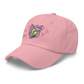 a pink indie street wear cap with a furry character embroidered on the front